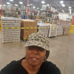 Kertrina helps out at the food bank in Dallas